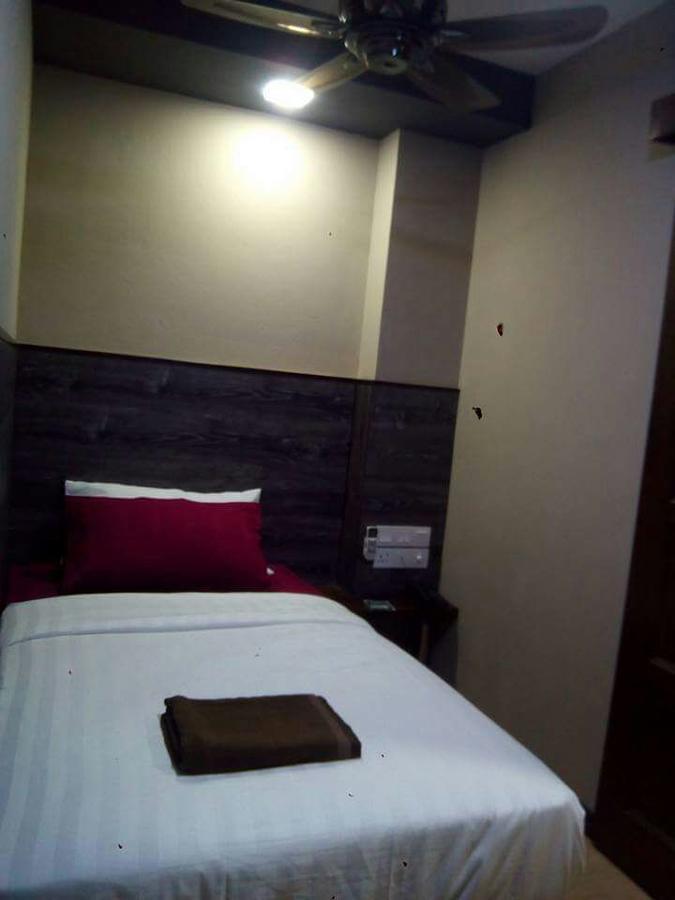 Hotel Qing Yun Resthouse -Delima Satu à Kampong Serusup Chambre photo