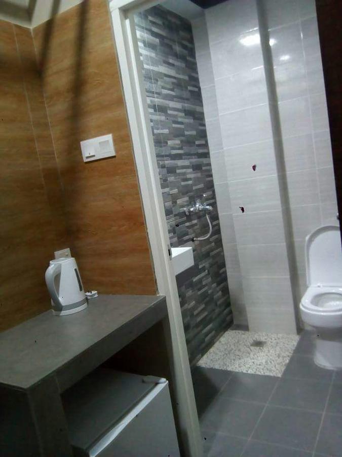 Hotel Qing Yun Resthouse -Delima Satu à Kampong Serusup Extérieur photo